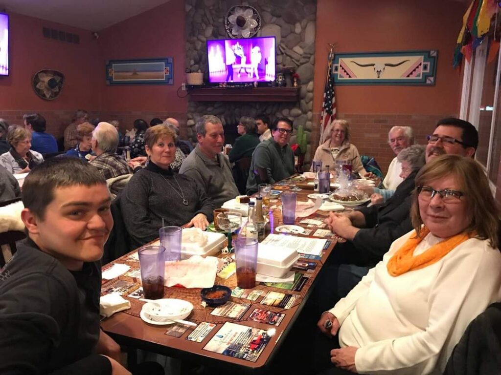 People sitting around table at a resturant
